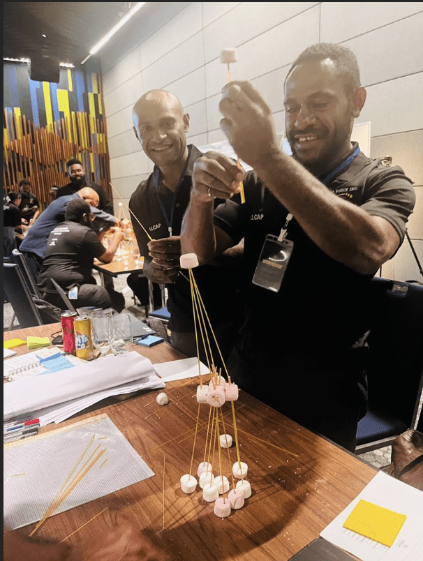 team working on the activity together with joy